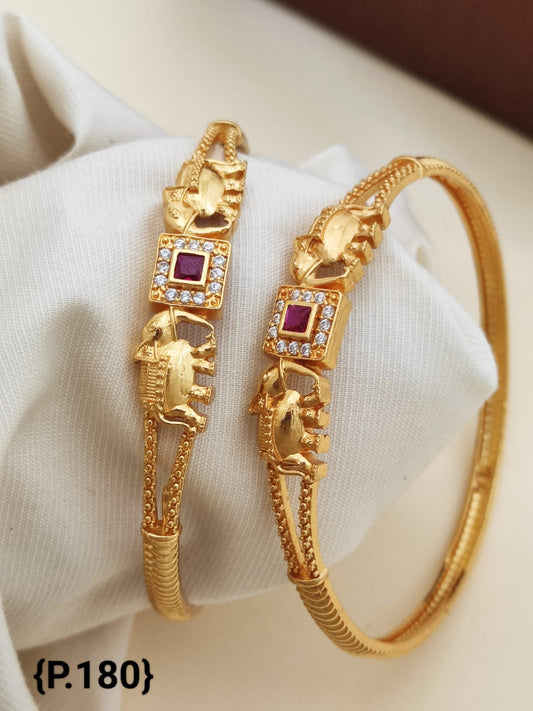 Stylish Daily Wear Golden Bangles With American Diamond