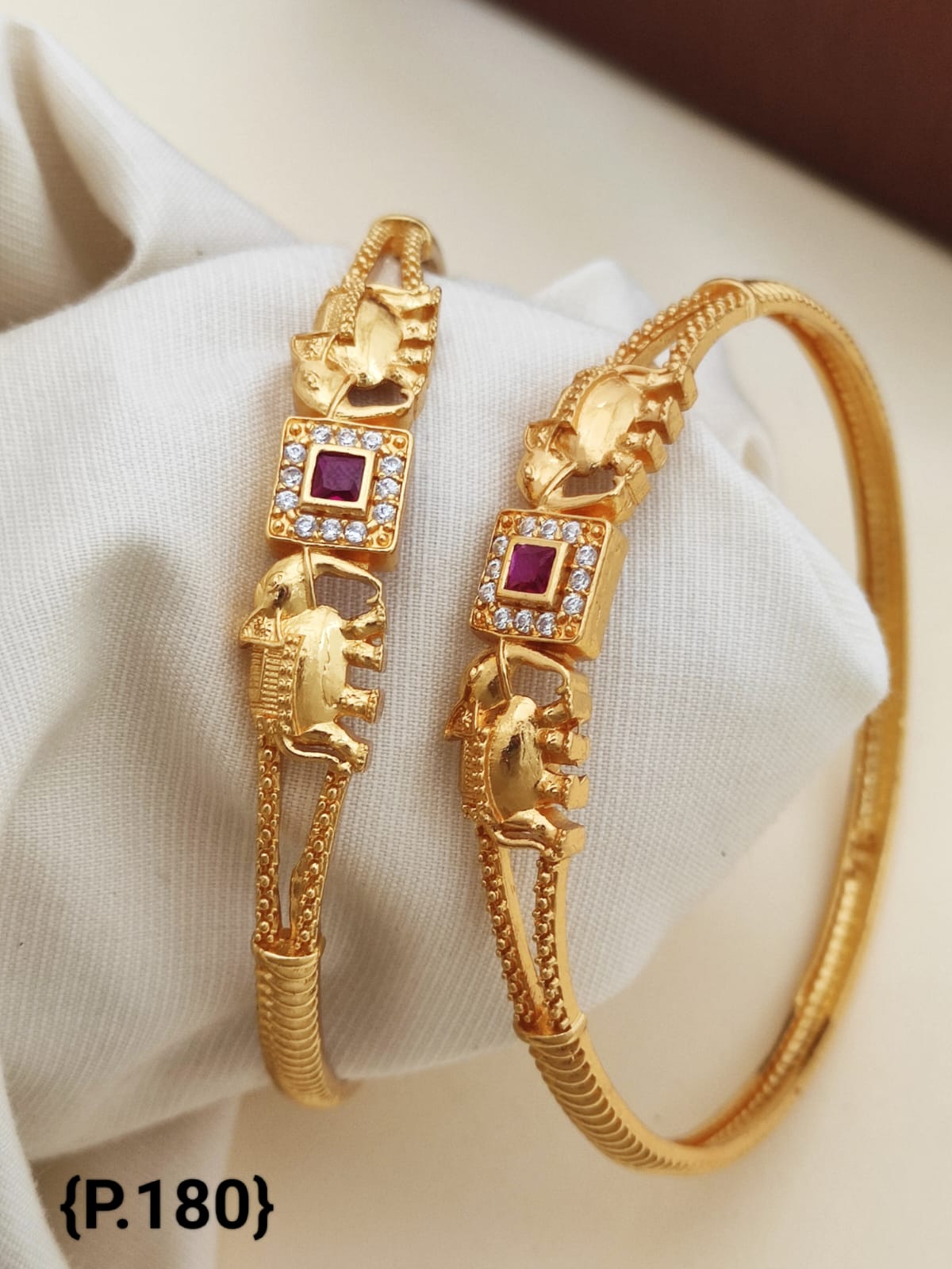 Stylish Daily Wear Golden Bangles With American Diamond