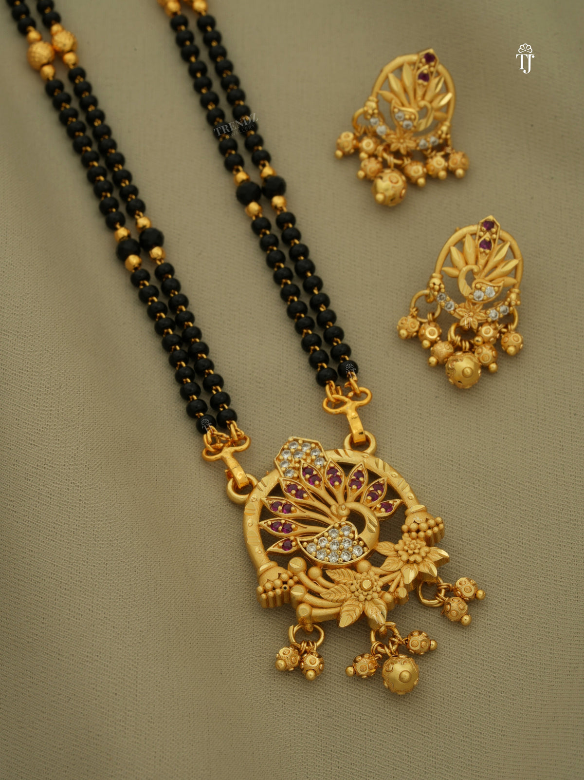 Gold Mangalsutra Designs for Women | Stylish Peacock Design with Matching Earrings & AD Diamonds